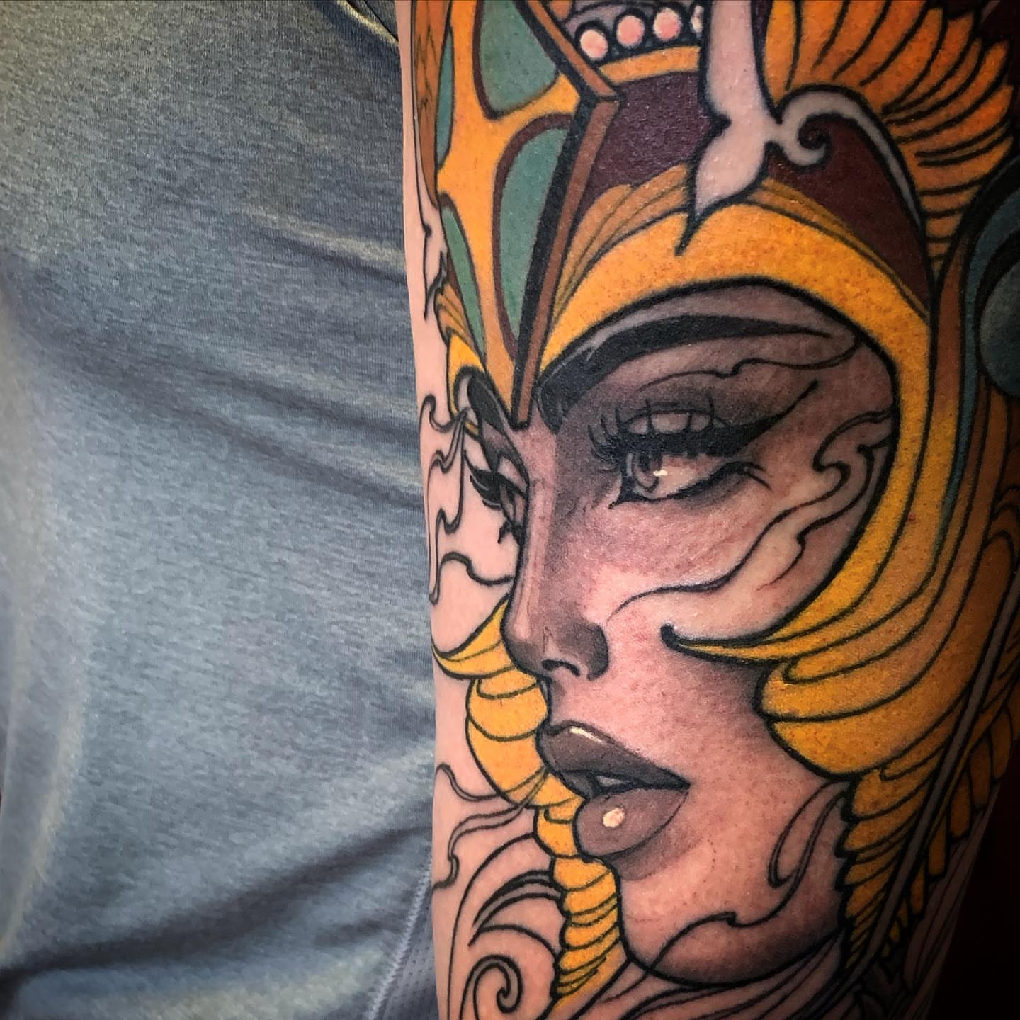 Woman with headdress illustrative tattoo on the forearm by Jeff Norton, Atascadero, California