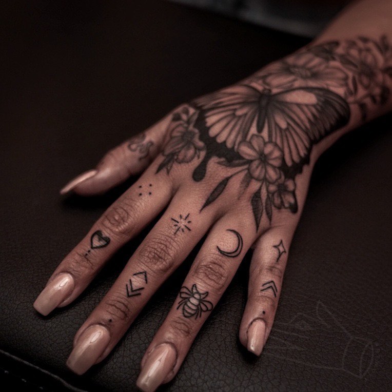 Floral and butterfly black and grey tattoo on the hand by ✧ Maria ✧
