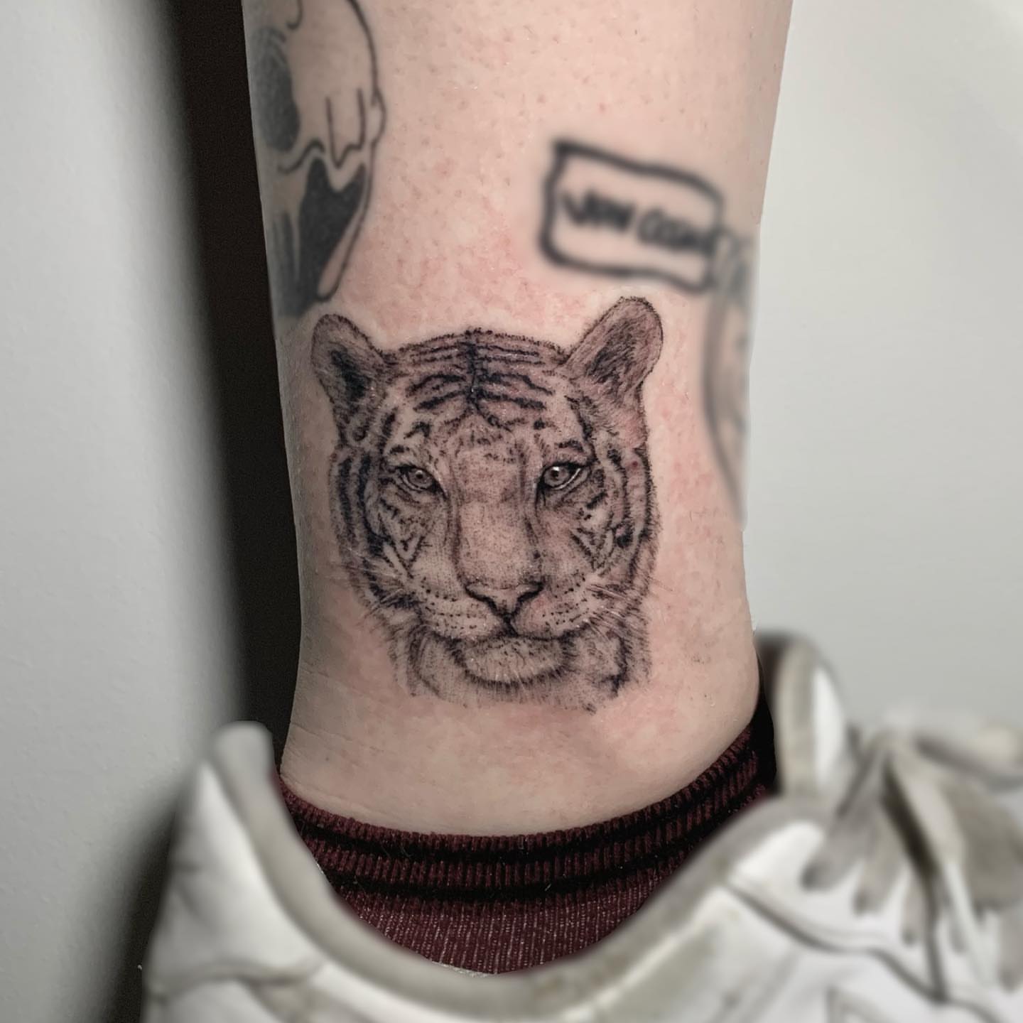 Tiger realism tattoo on the forearm by Megan McKee Tattoo Artist