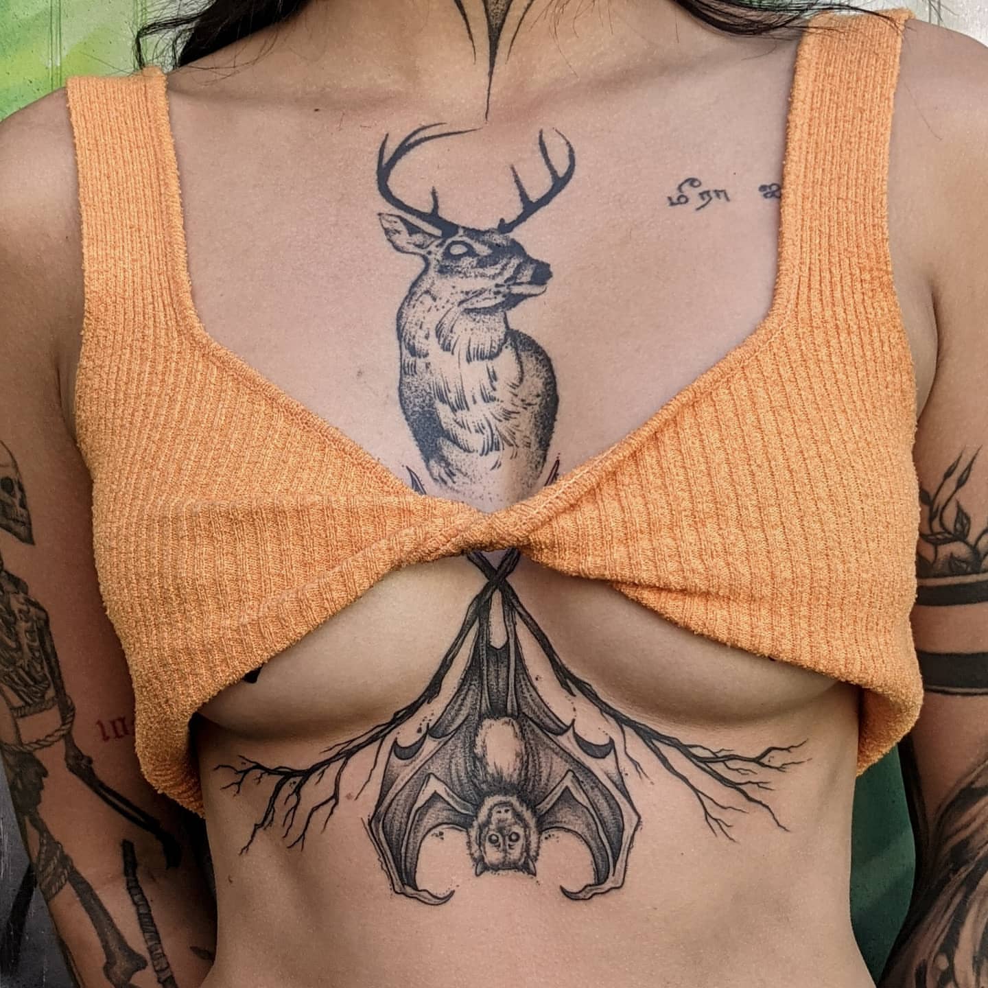 Deer and bat realism tattoo on the chest by Gail Howard Perry III