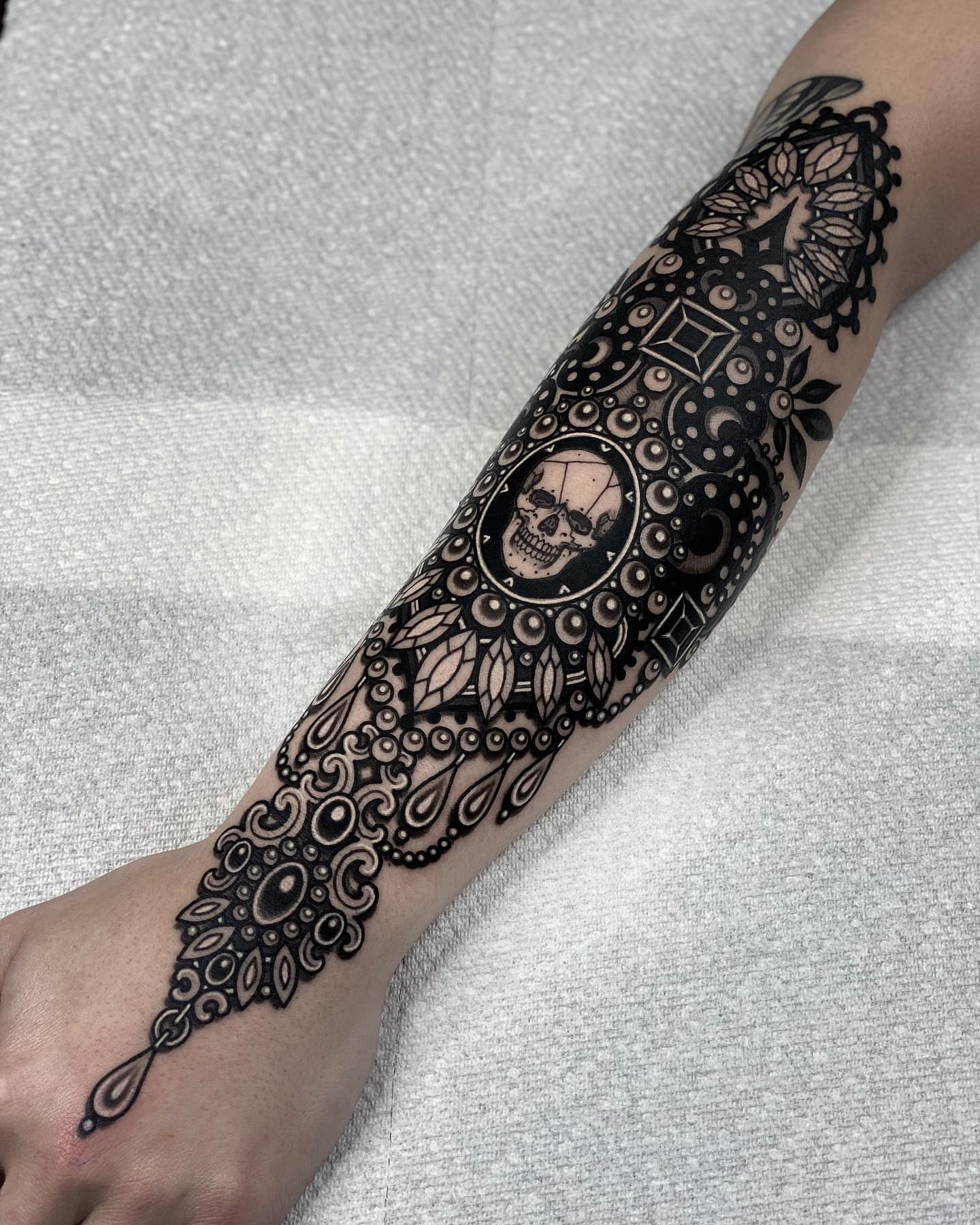 Geometric mandala geometric tattoo on the forearm by Tyler Charles