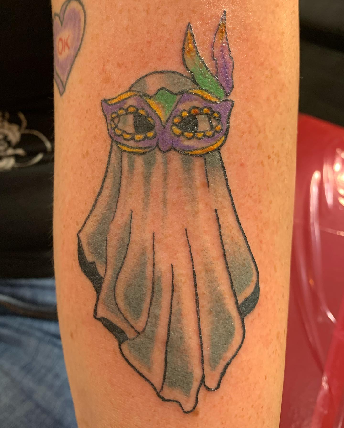 Owl mask American traditional tattoo on the forearm by IdleHandsFlex, New Orleans, Louisiana