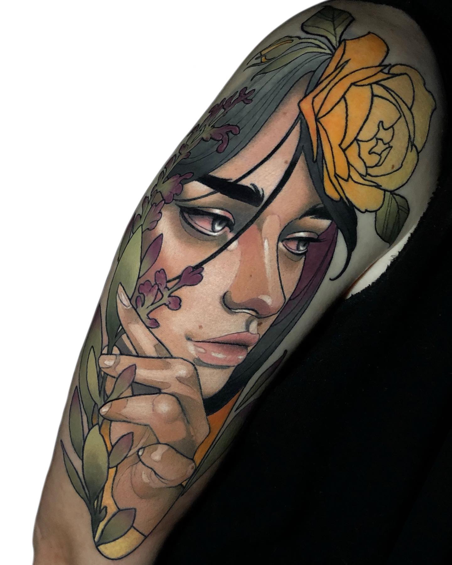 Woman with floral crown realism tattoo on the upper arm by Levi Murphy