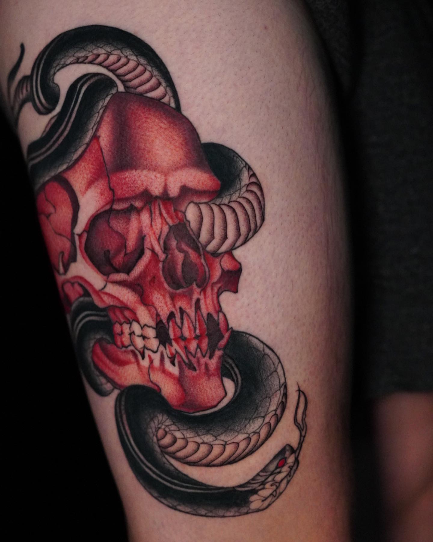 Skull and snake realism tattoo on the forearm by Neo-Traditional tattoos in Las Vegas