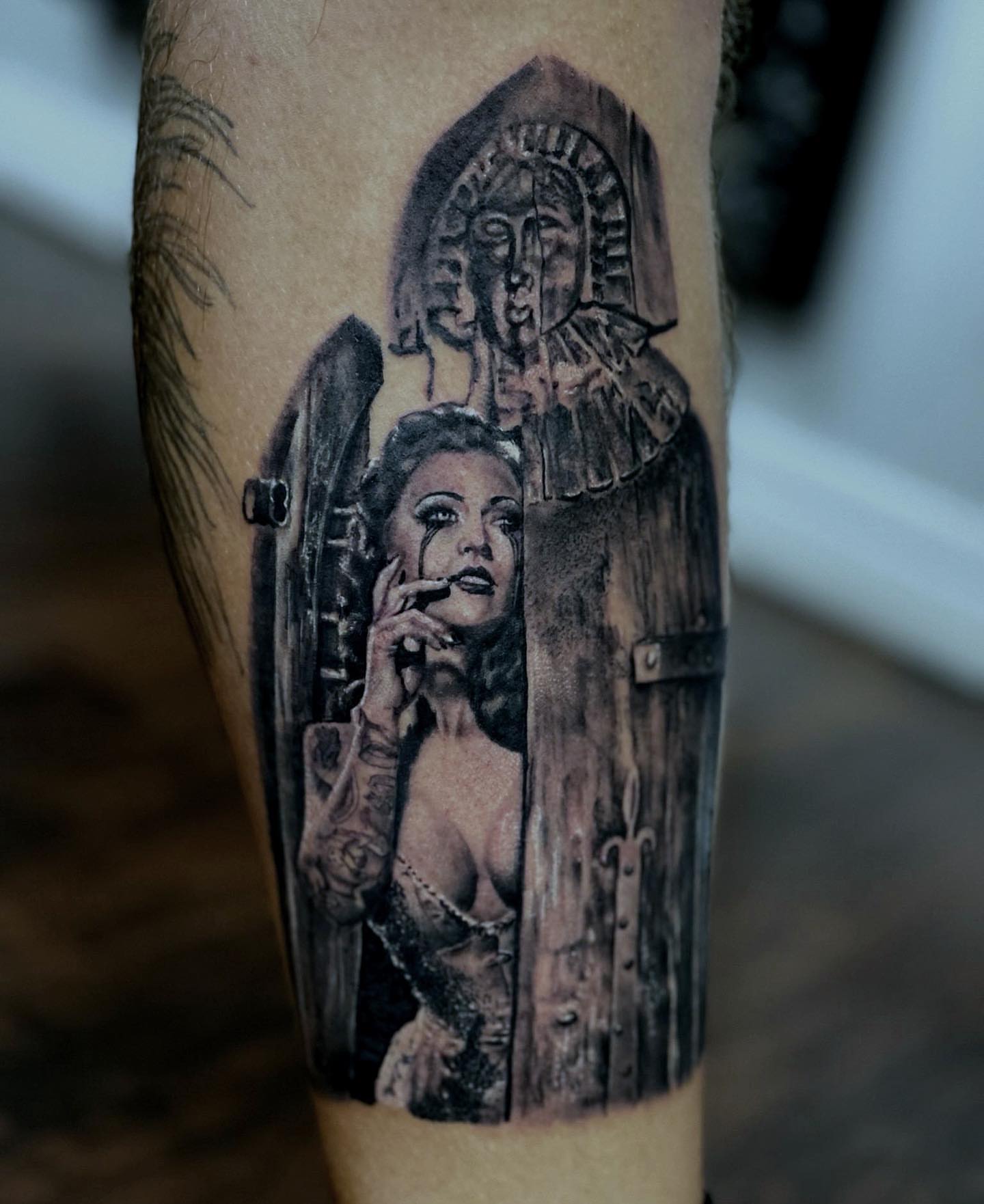 Woman in doorway realism tattoo on the forearm by Kevin Bradley Jr, Mesa, Arizona