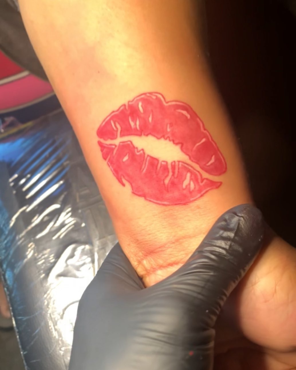 Lips dotwork tattoo on the forearm by Wichita Tattoo