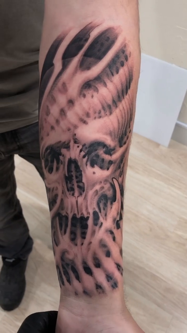 Skull with abstract elements realism tattoo by Oak Adams