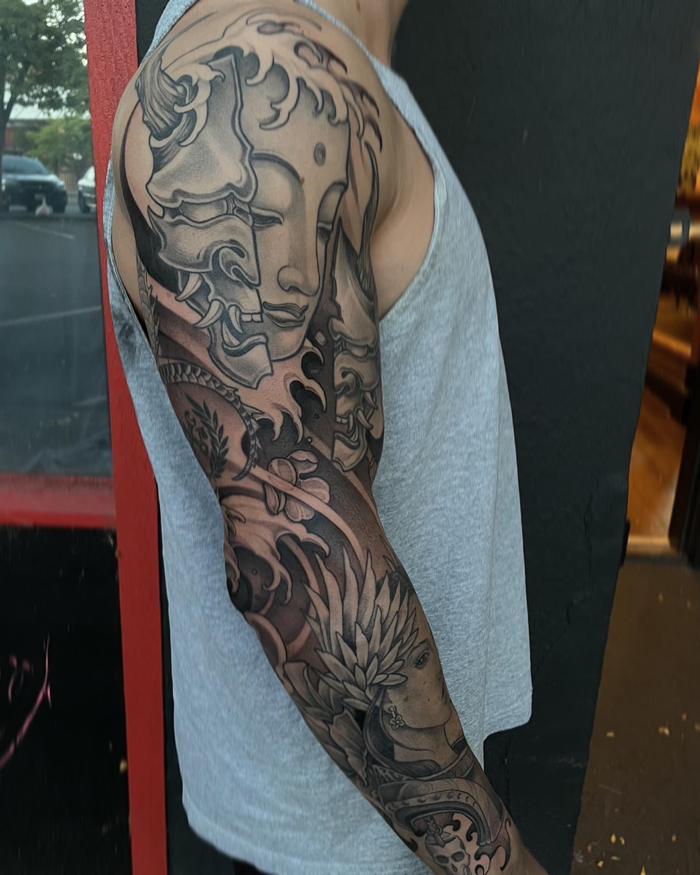 Woman's face realism tattoo on the upper arm by Madelyn Roberts, Bellingham, Washington