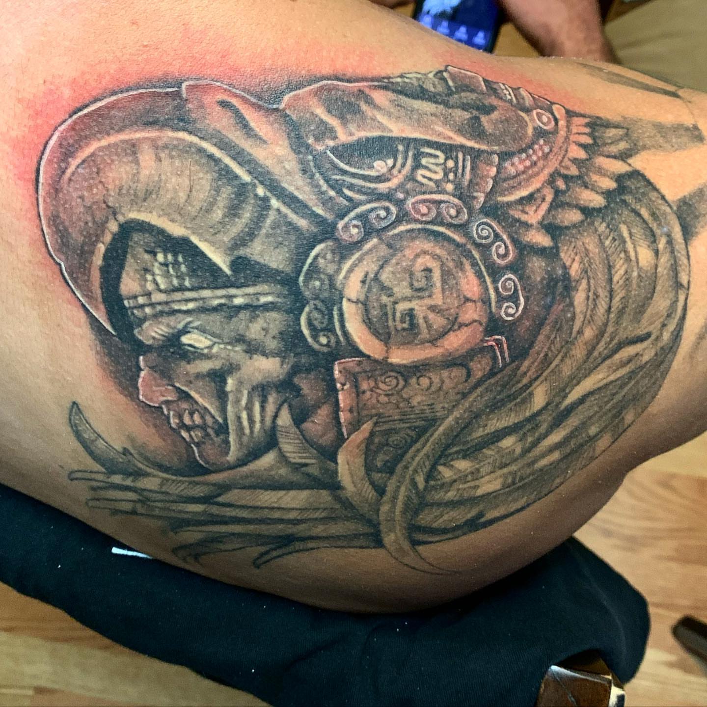Ancient artifact realism tattoo on the thigh by Daniel Illachek
