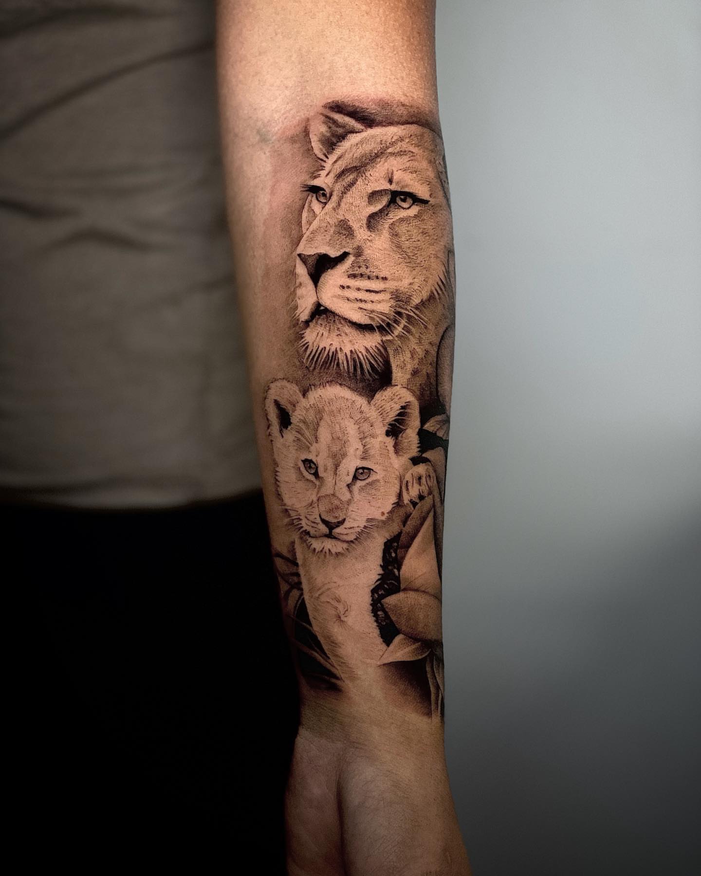 Lion and cub realism tattoo on the forearm by 🇵🇭Mark Gaño