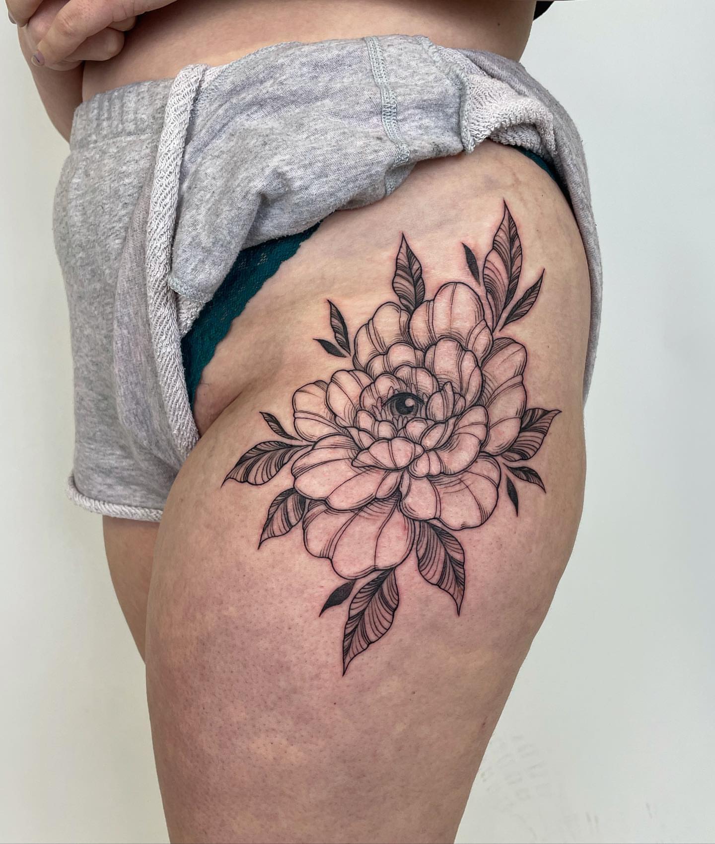 Peony flower black and grey tattoo on the thigh by @jettaturas, New City, New York