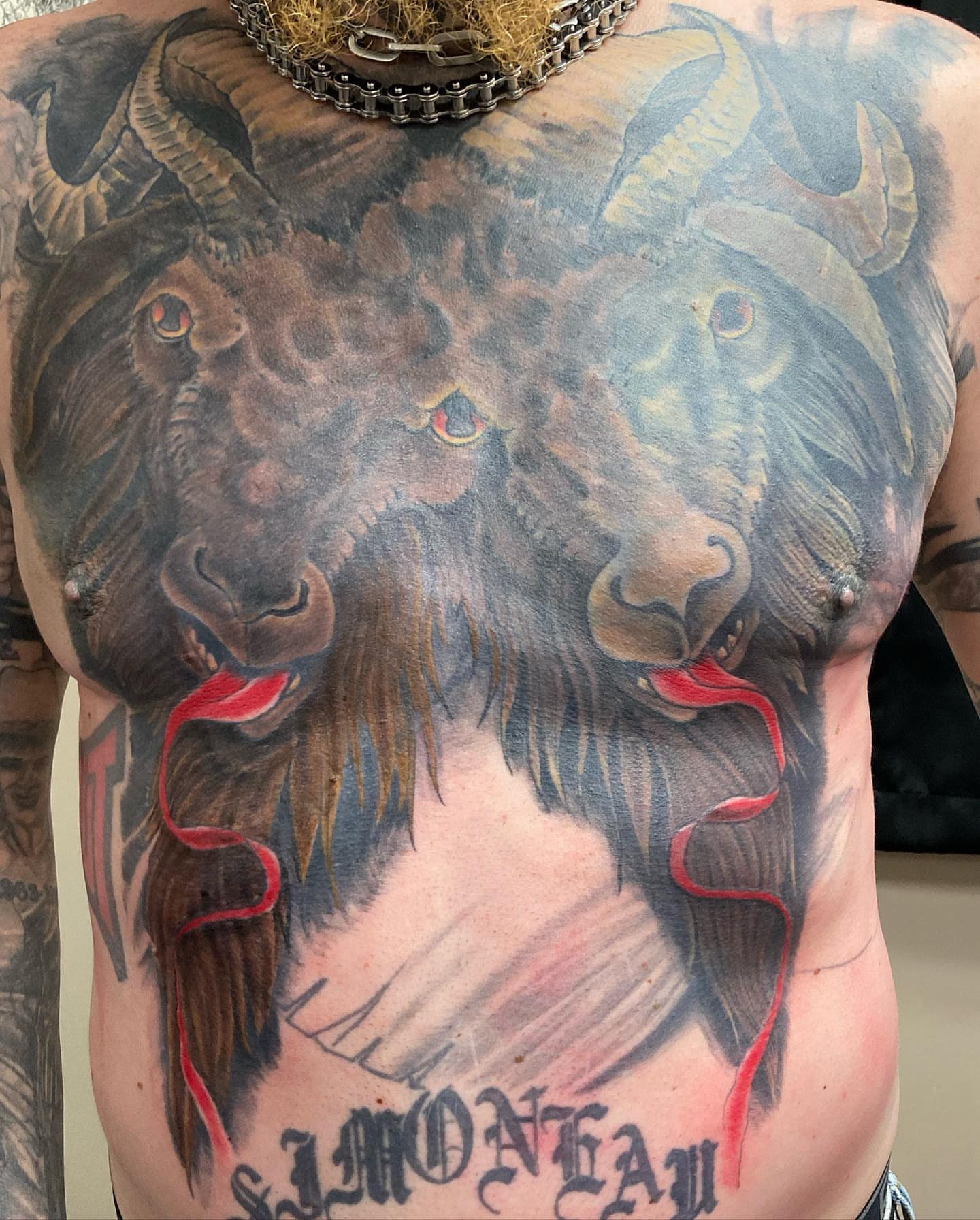 Goats realism tattoo on the chest by Chuck House