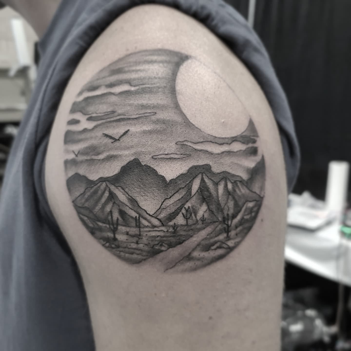 Desert landscape realism tattoo on the shoulder by Neri Gersaint