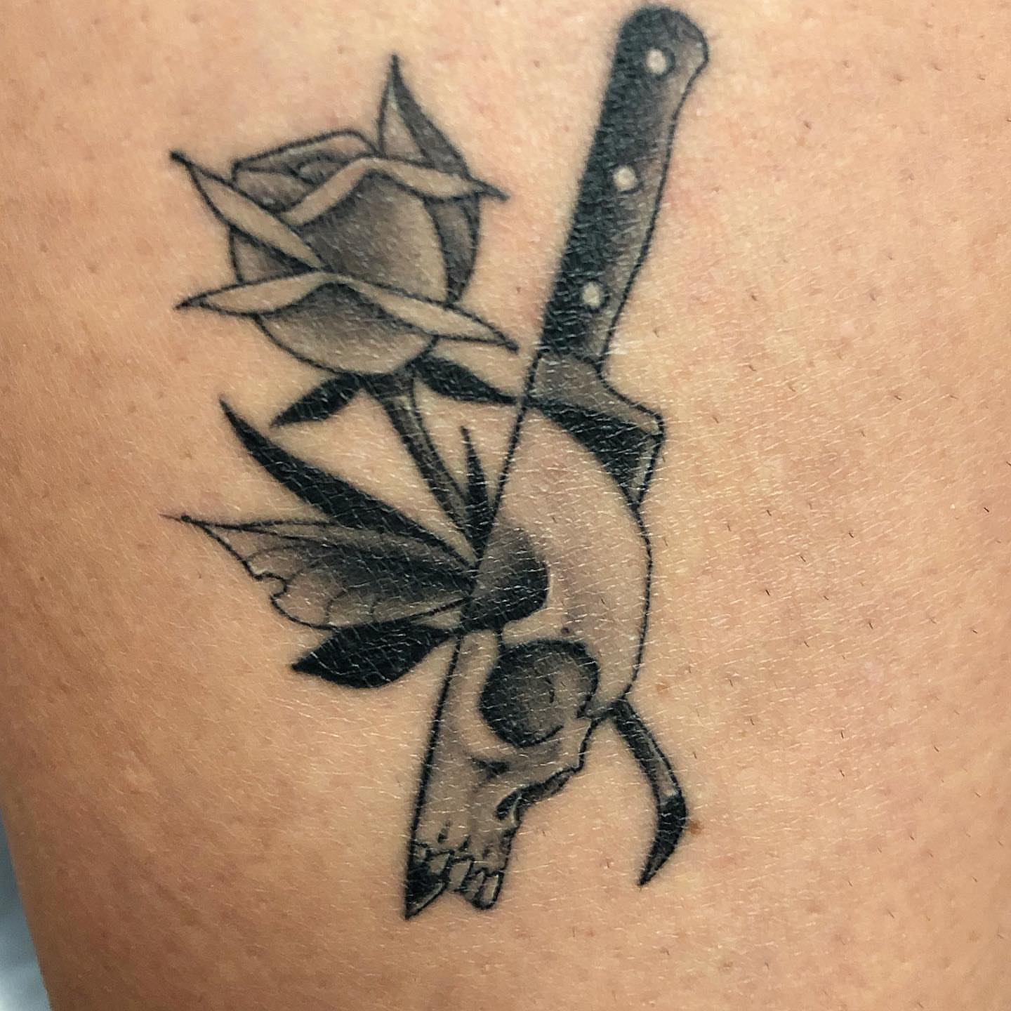 Rose and knife black and grey tattoo on the forearm by 𝕵𝖆𝖞 𝕽𝖎𝖟𝖟𝖔