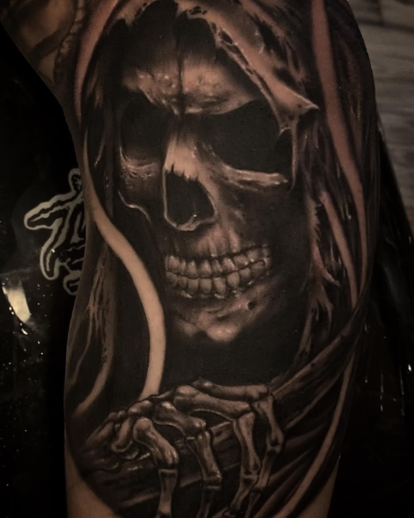 Skull realism tattoo on the upper arm by ⠀⠀ ⠀ ⠀ ⠀⠀ ⠀⠀ ⠀⠀ ⠀ ⠀⠀ ⠀⠀ᎪᎳᏃ, West Hollywood, California