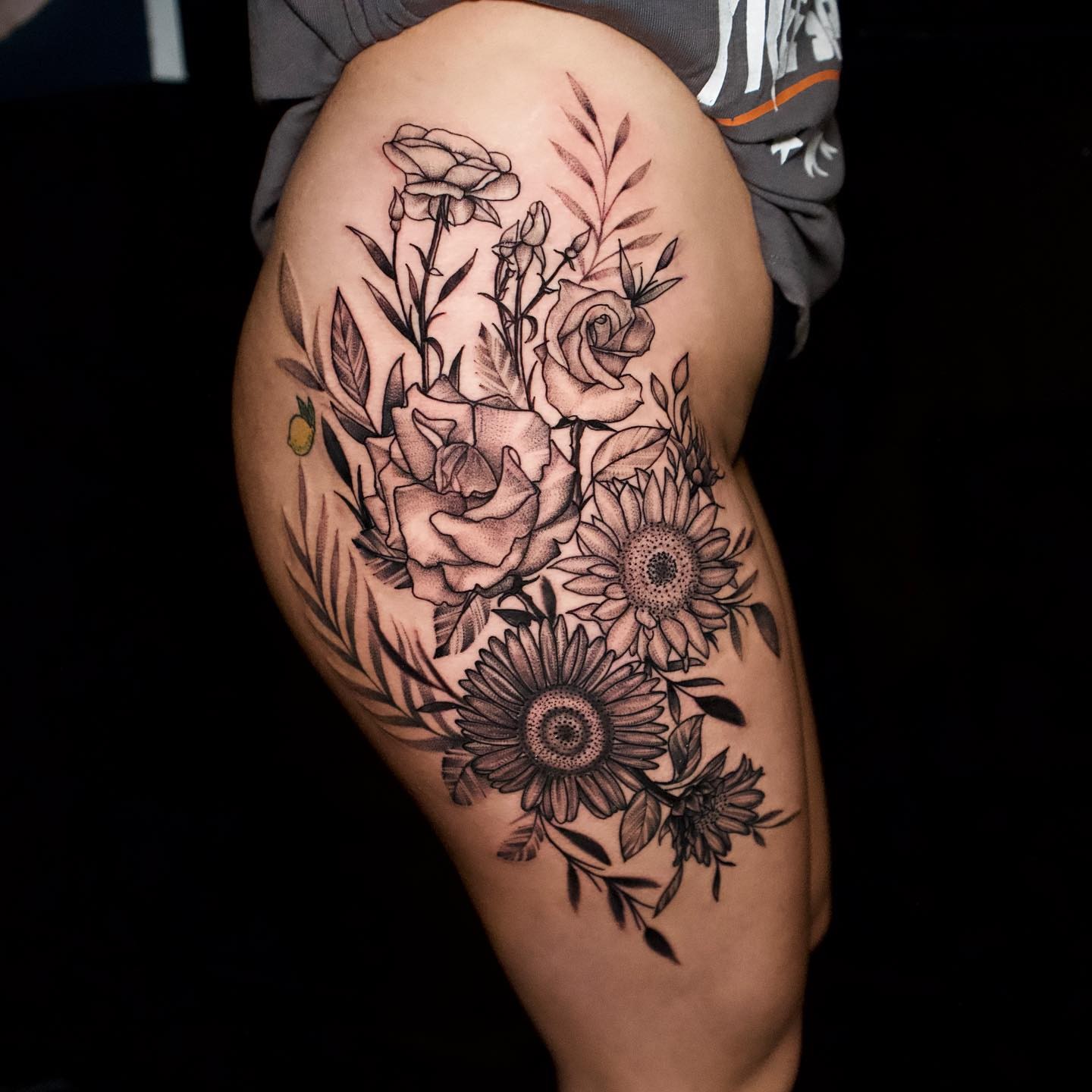 Floral bouquet dotwork tattoo on the thigh by all gas no brakes! no days off!