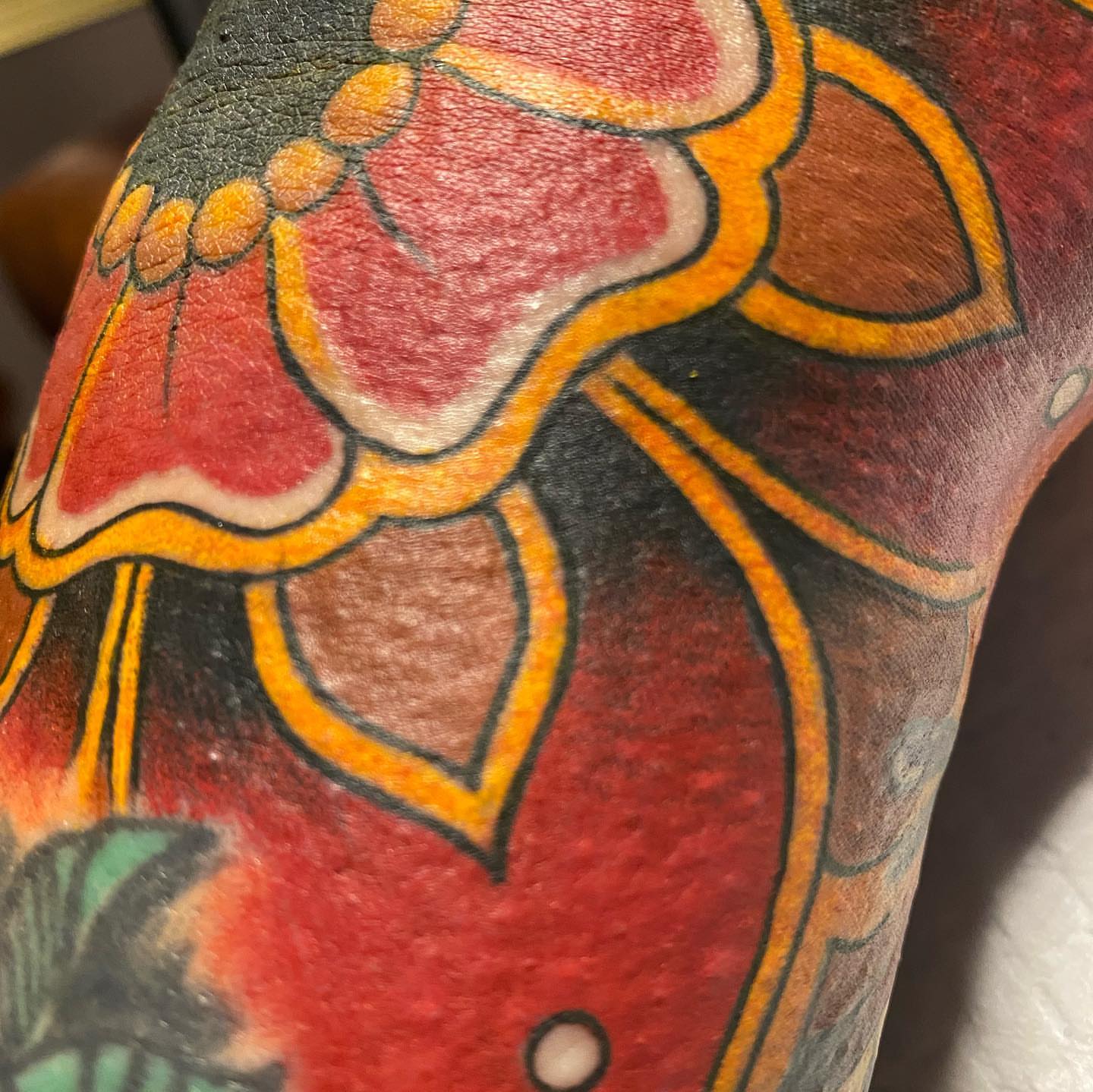 Lotus flower American traditional tattoo on the upper arm by Jenni Hand - Tattoo, Maryville, Tennessee