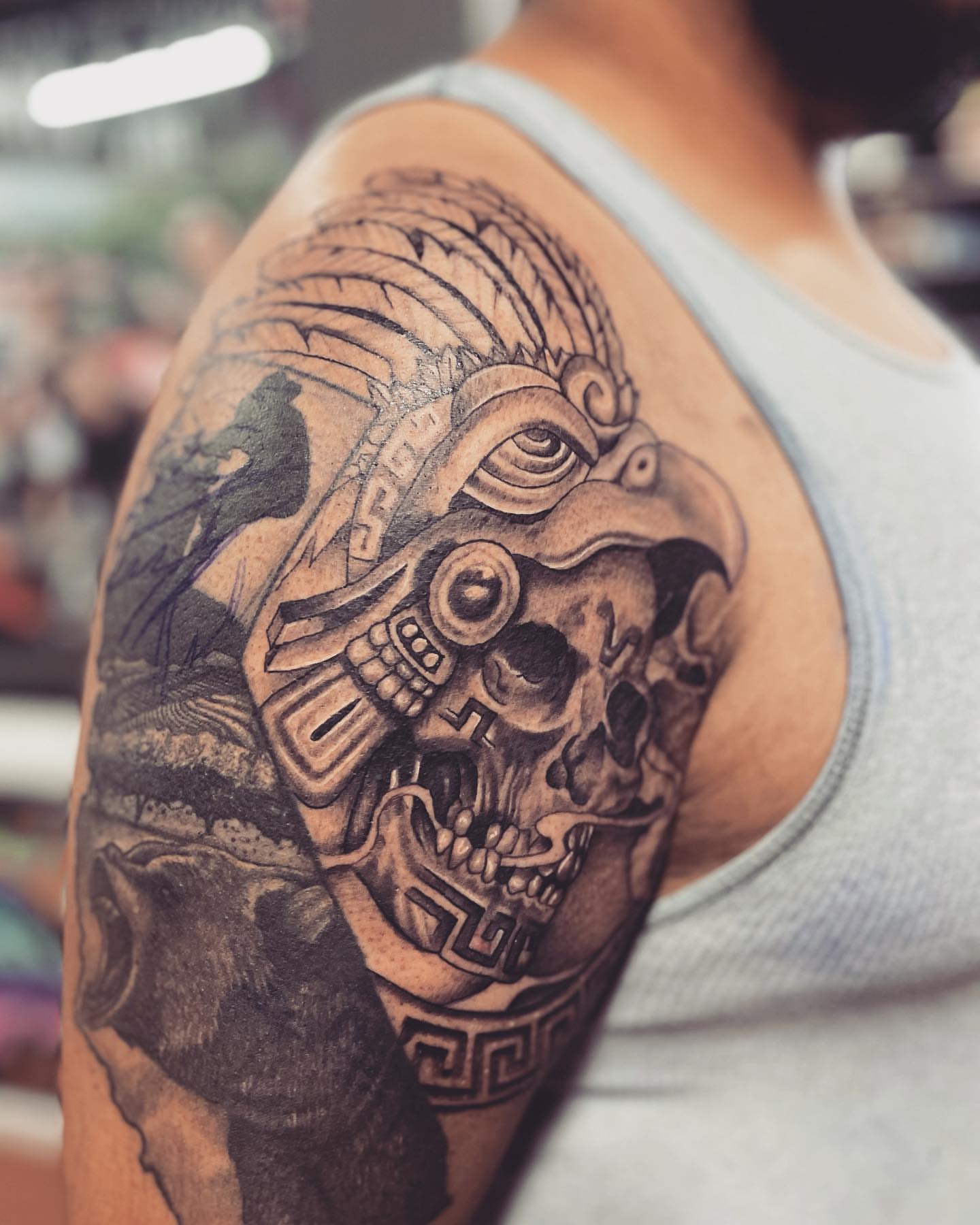 Skull with headdress realism tattoo on the shoulder by Immortal BAYAREA TATTOO ARTIST