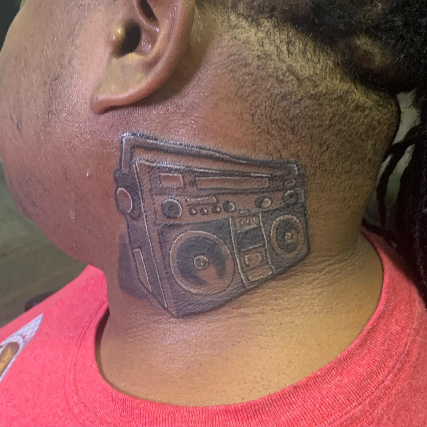 Boombox realism tattoo on the neck by Wichita Tattoo