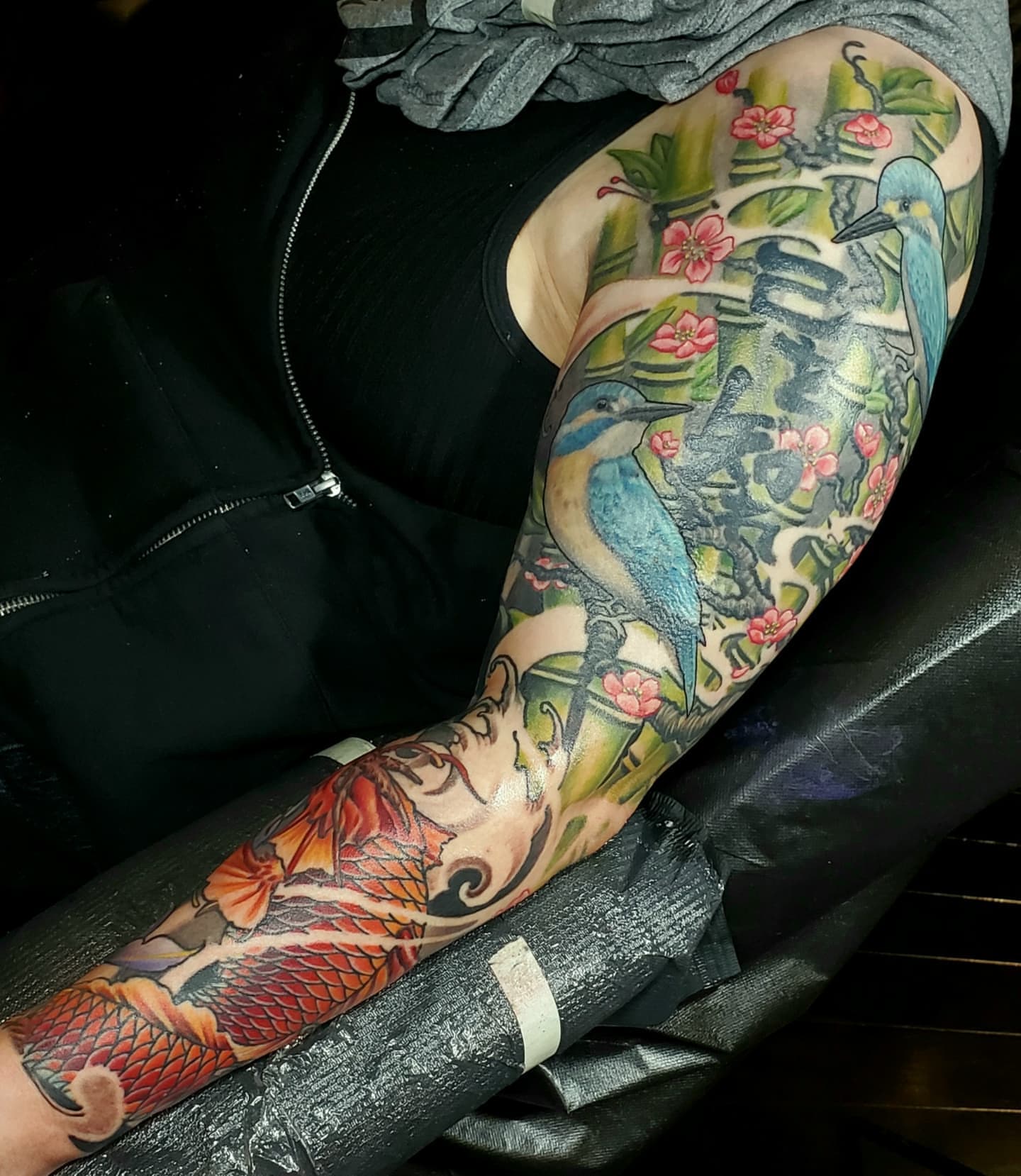 Koi fish and birds japanese irezumi tattoo on the forearm by Jake Goss, Salt Lake City, Utah