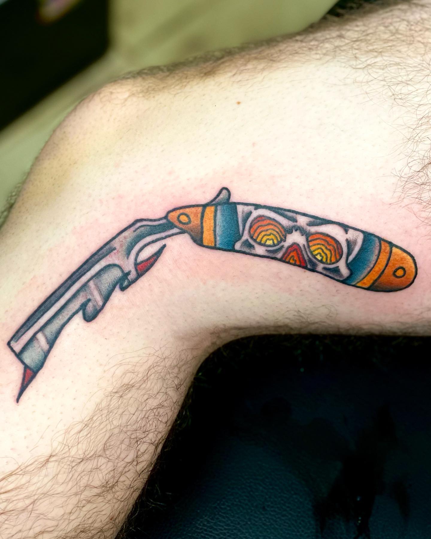 Knife American traditional tattoo on the forearm by Erin Stephens