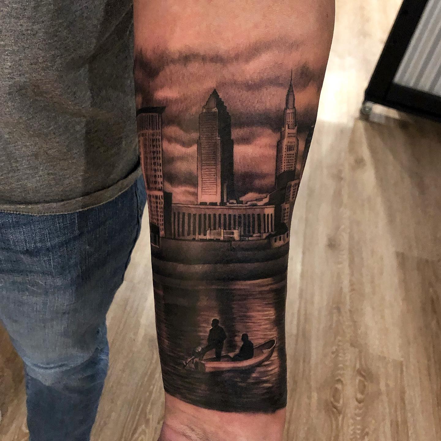Cityscape realism tattoo on the forearm by Bill Johenning, Lakewood, Ohio