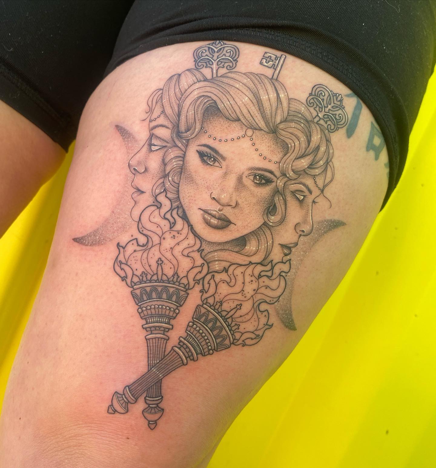 Woman with torch realism tattoo on the thigh by ✨ Jaden Belle Tattoos ✨