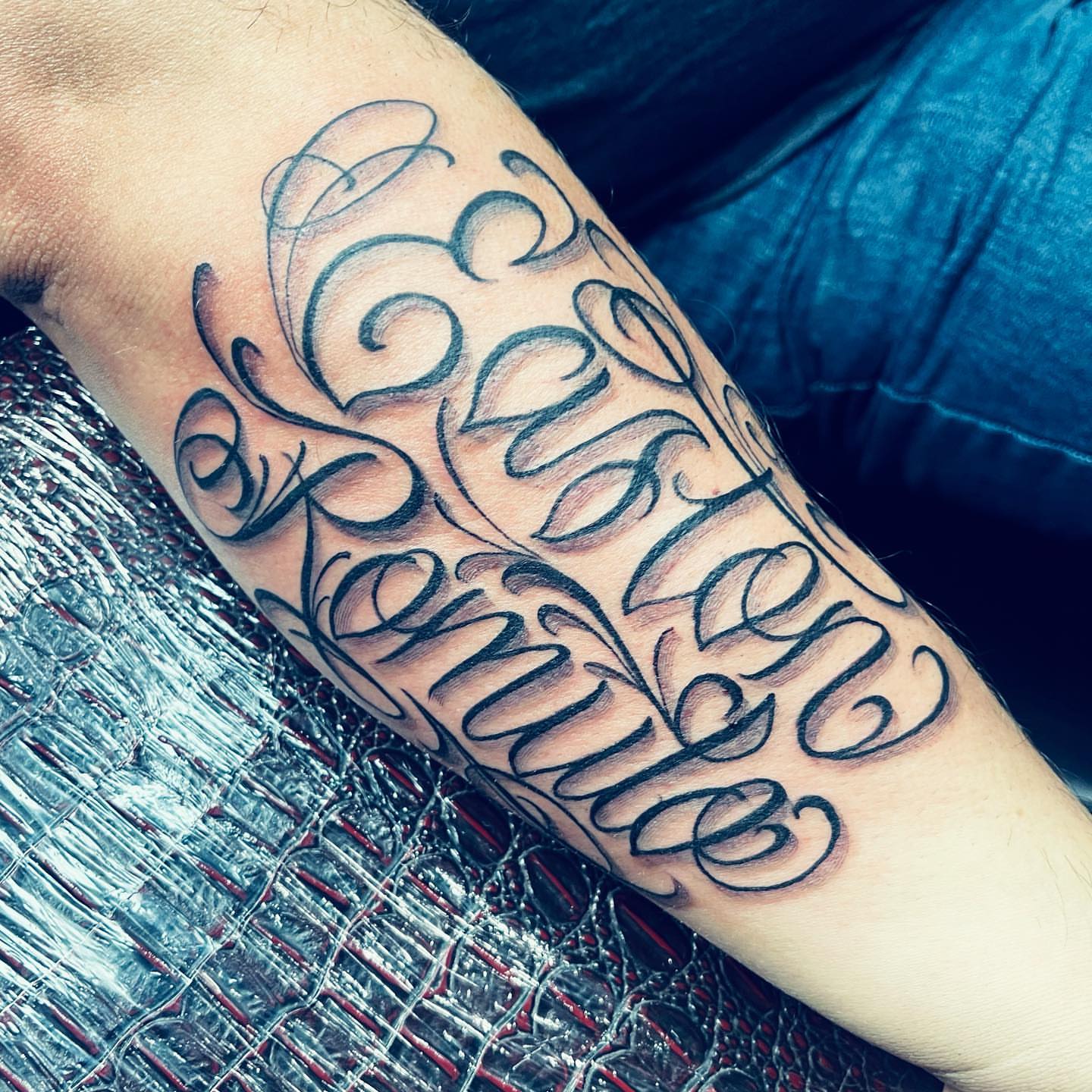 Script lettering lettering script tattoo on the forearm by Peewee Morales