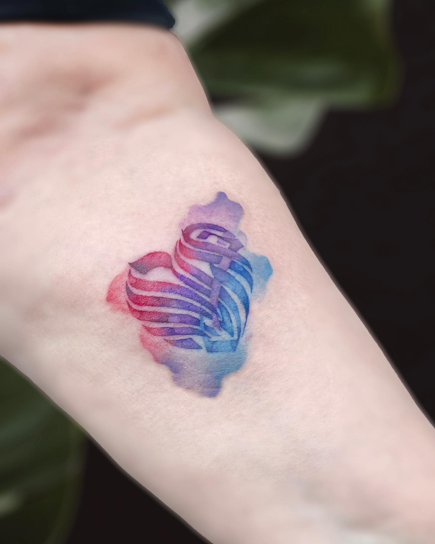 Tattoo by @georgiagreytattoos — watercolor