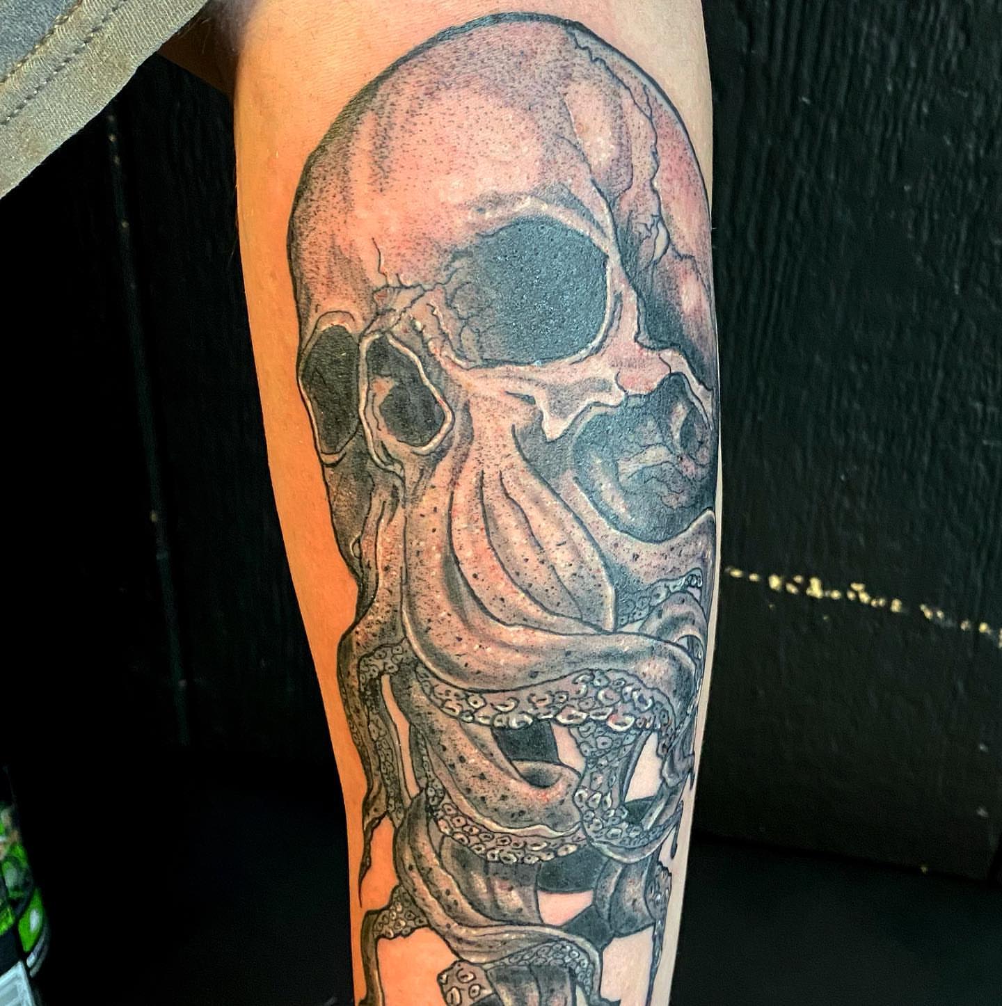 Skull and tentacles dotwork tattoo on the forearm by Anthony Pichardo 🦇