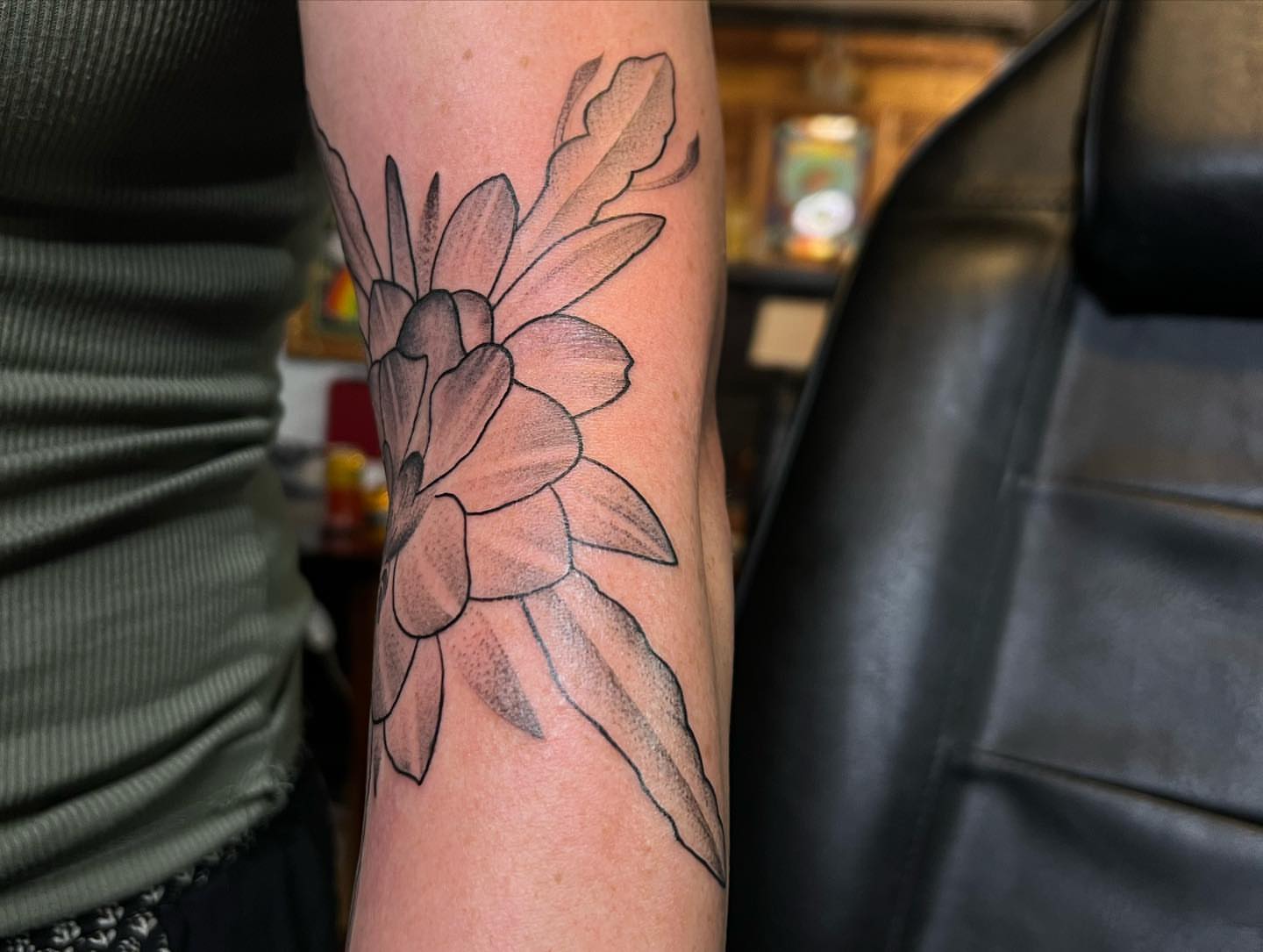 Flower dotwork tattoo on the forearm by Ałex, Portland, Oregon