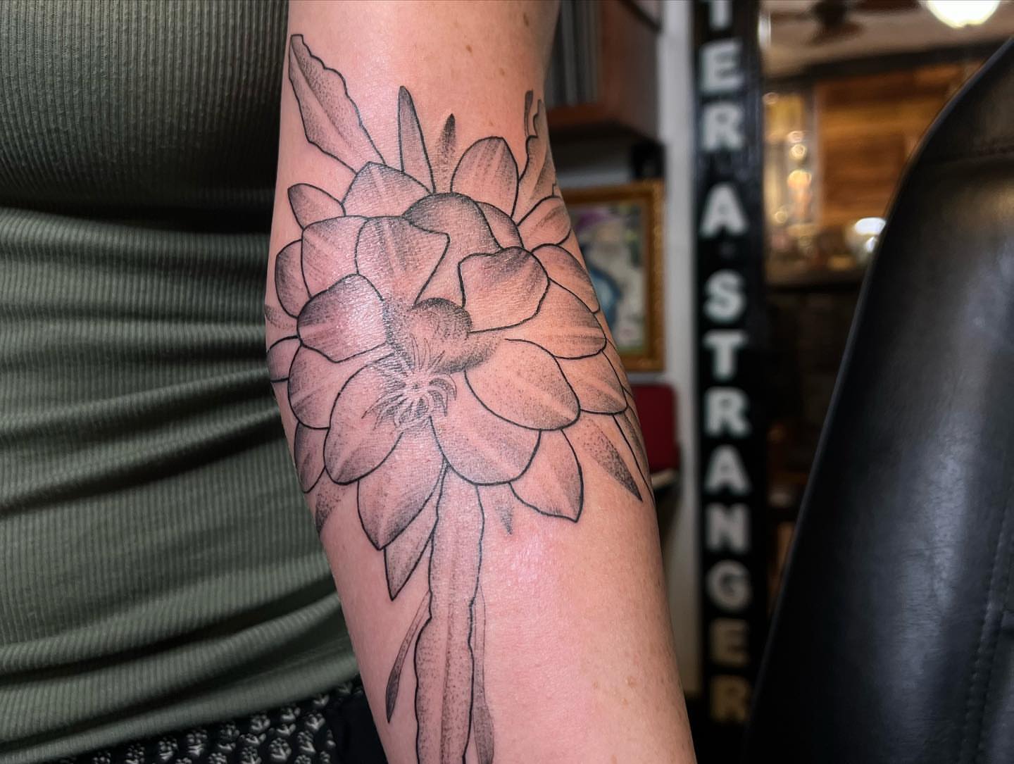 Flower dotwork tattoo on the forearm by Ałex, Portland, Oregon