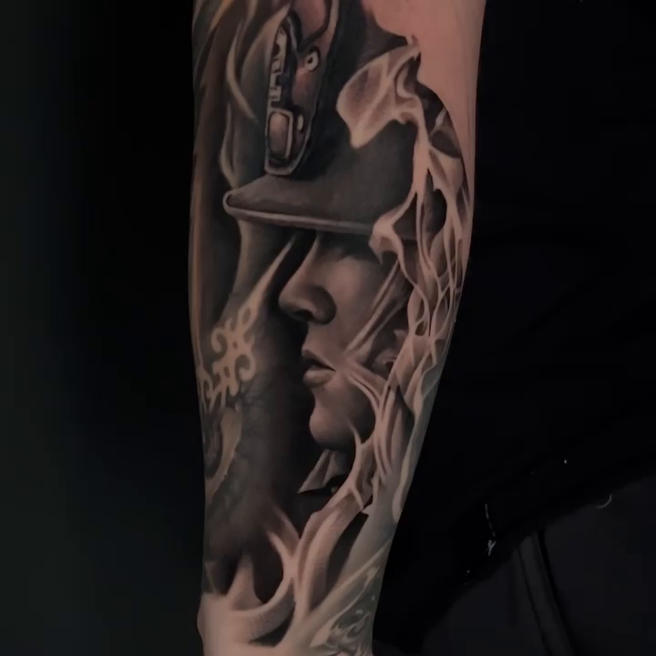 Man in hat with smoke realism tattoo by Travis Chick