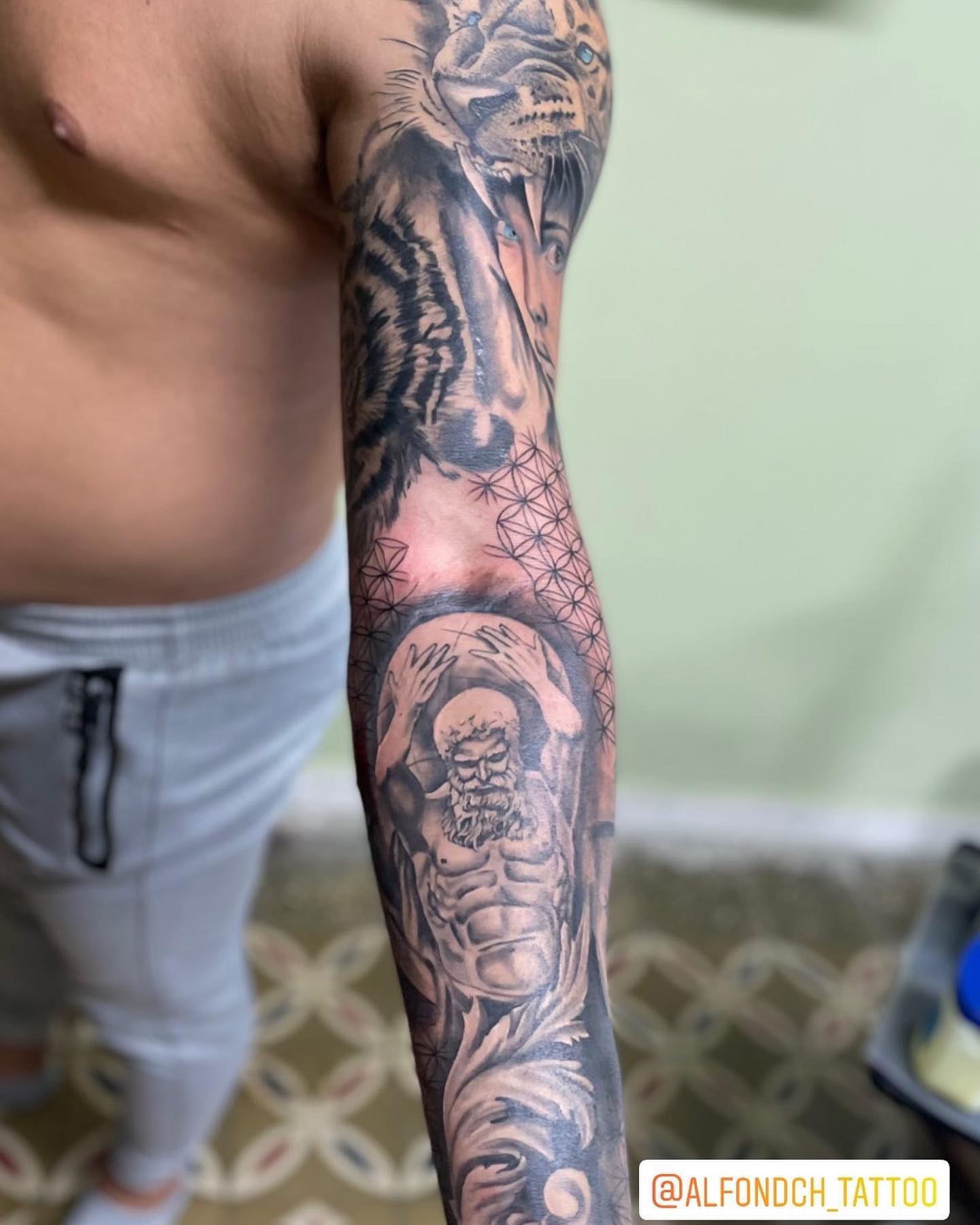 Tattoo by @alfontattoo_ink — black_and_grey, realism