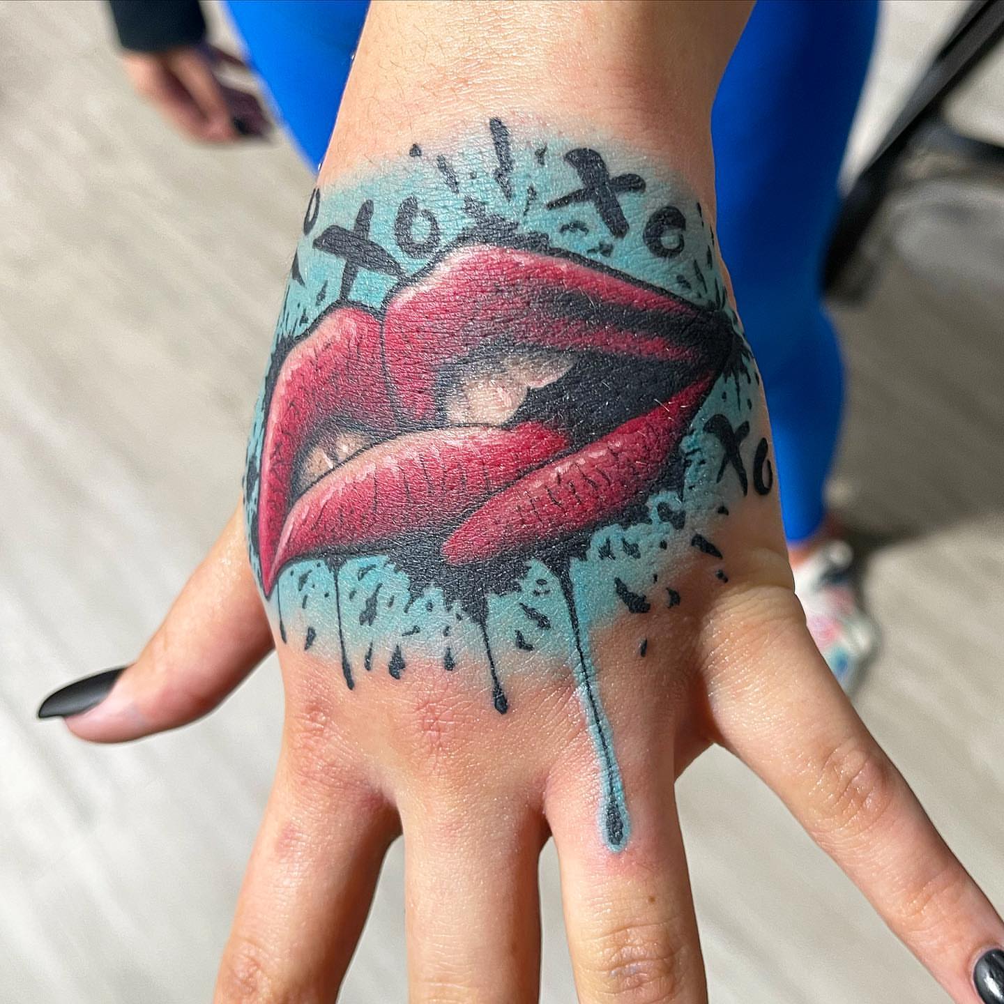 Lips realism tattoo on the hand by Zack Havoc