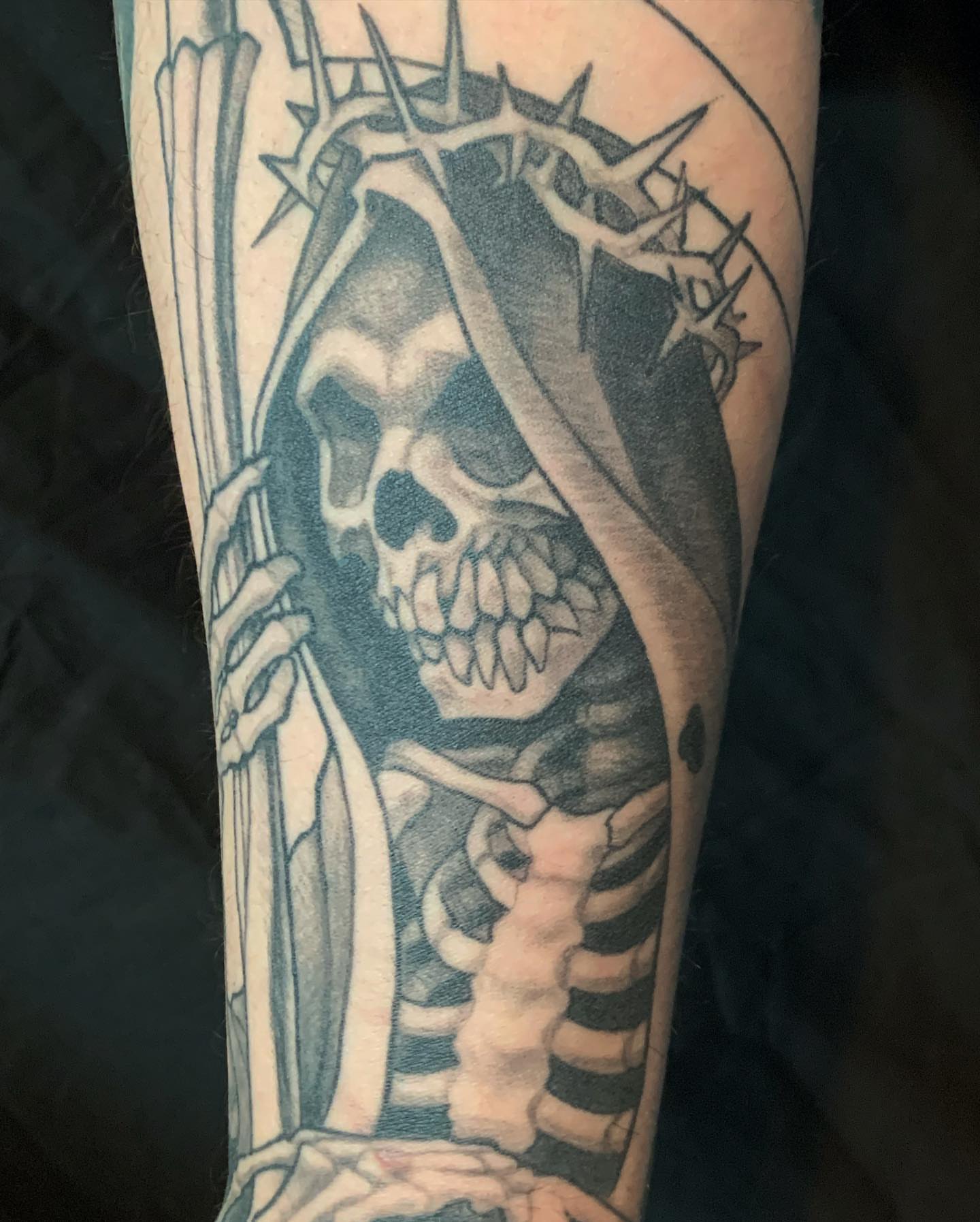 Grim reaper realism tattoo on the forearm by shane baker