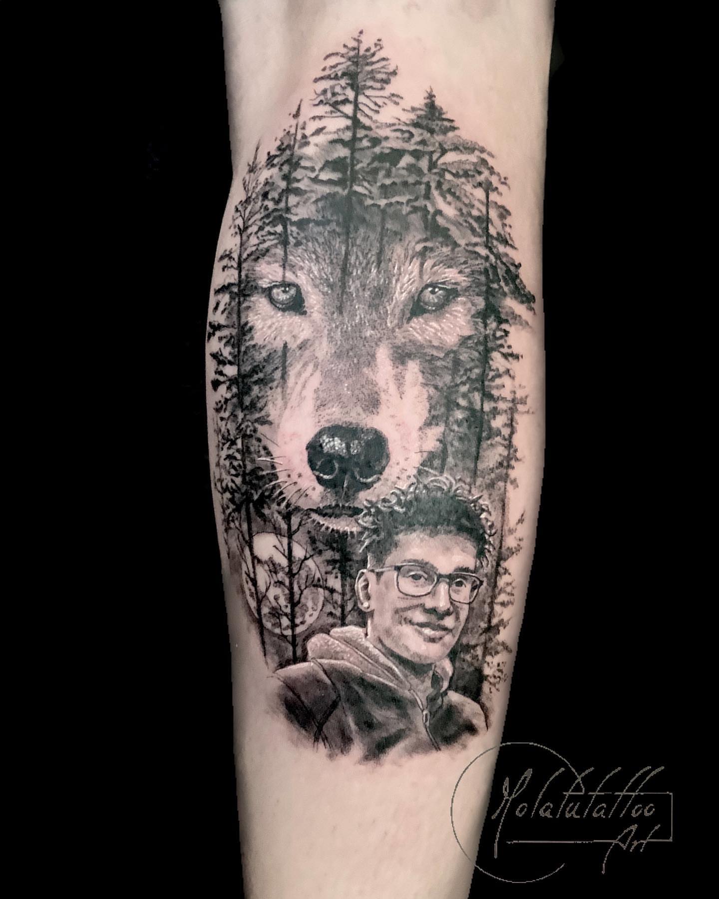 Wolf and portrait realism tattoo on the forearm by Molatutattoo