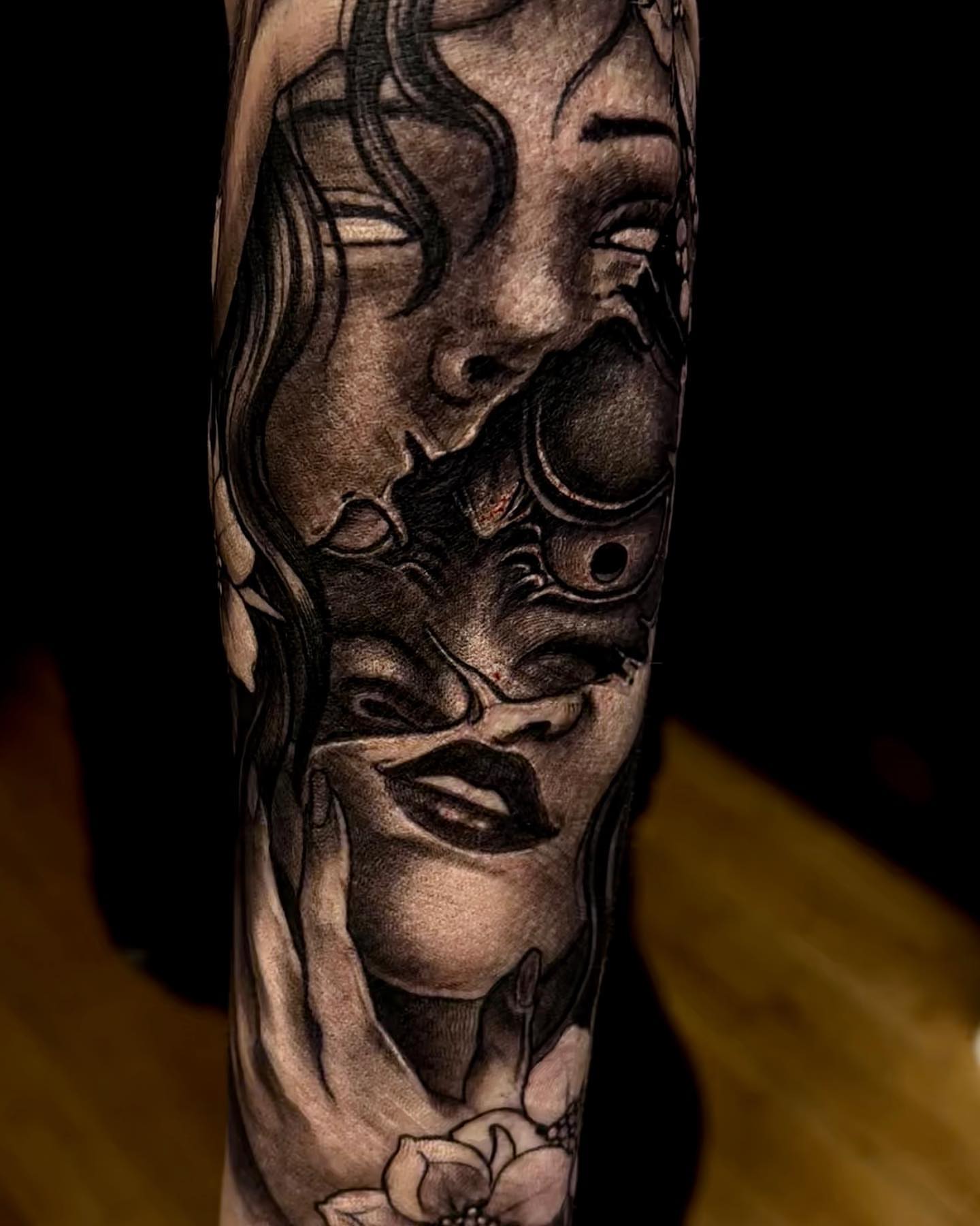 Woman's face realism tattoo on the forearm by Vinny Holistic Ink
