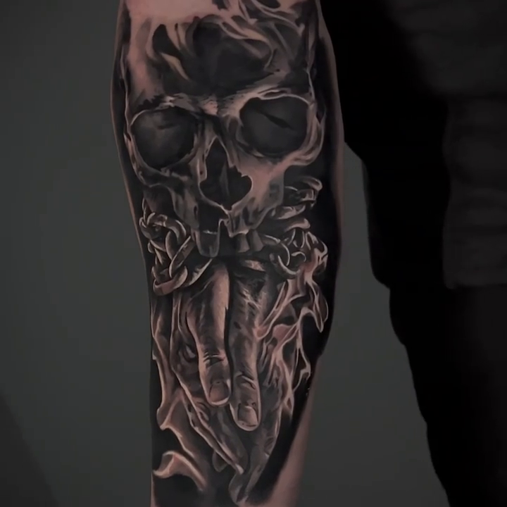 Skull with hands and roses dark realism tattoo by Travis Chick