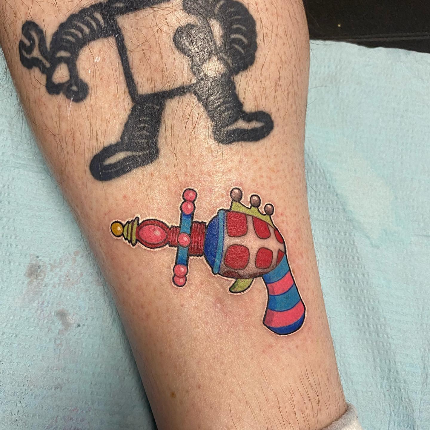 Toy robot trash polka tattoo on the forearm by 🦇💀Matt Perlman💀🦇