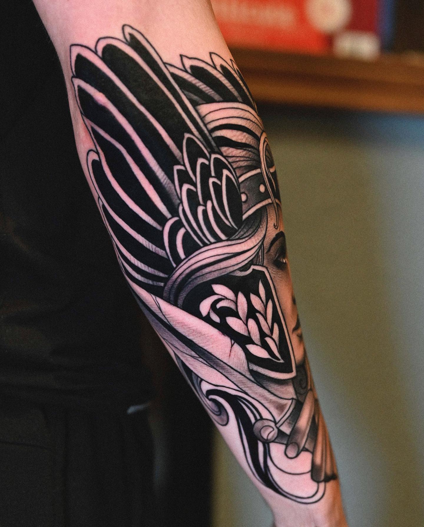 Winged helmet American traditional tattoo on the forearm by Lorenzo Lopez