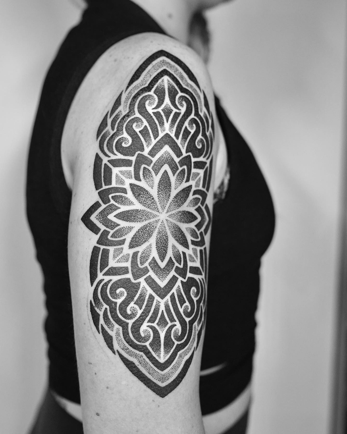 Tattoo by @rjxdots — dotwork, geometric