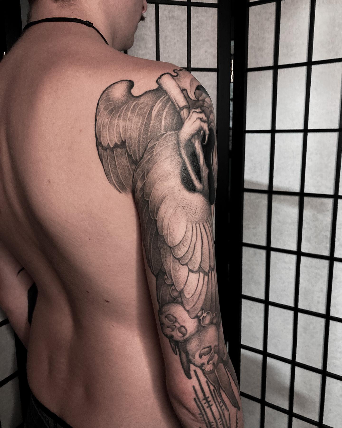 Tattoo by @kairo.tattooer — black_and_grey, realism