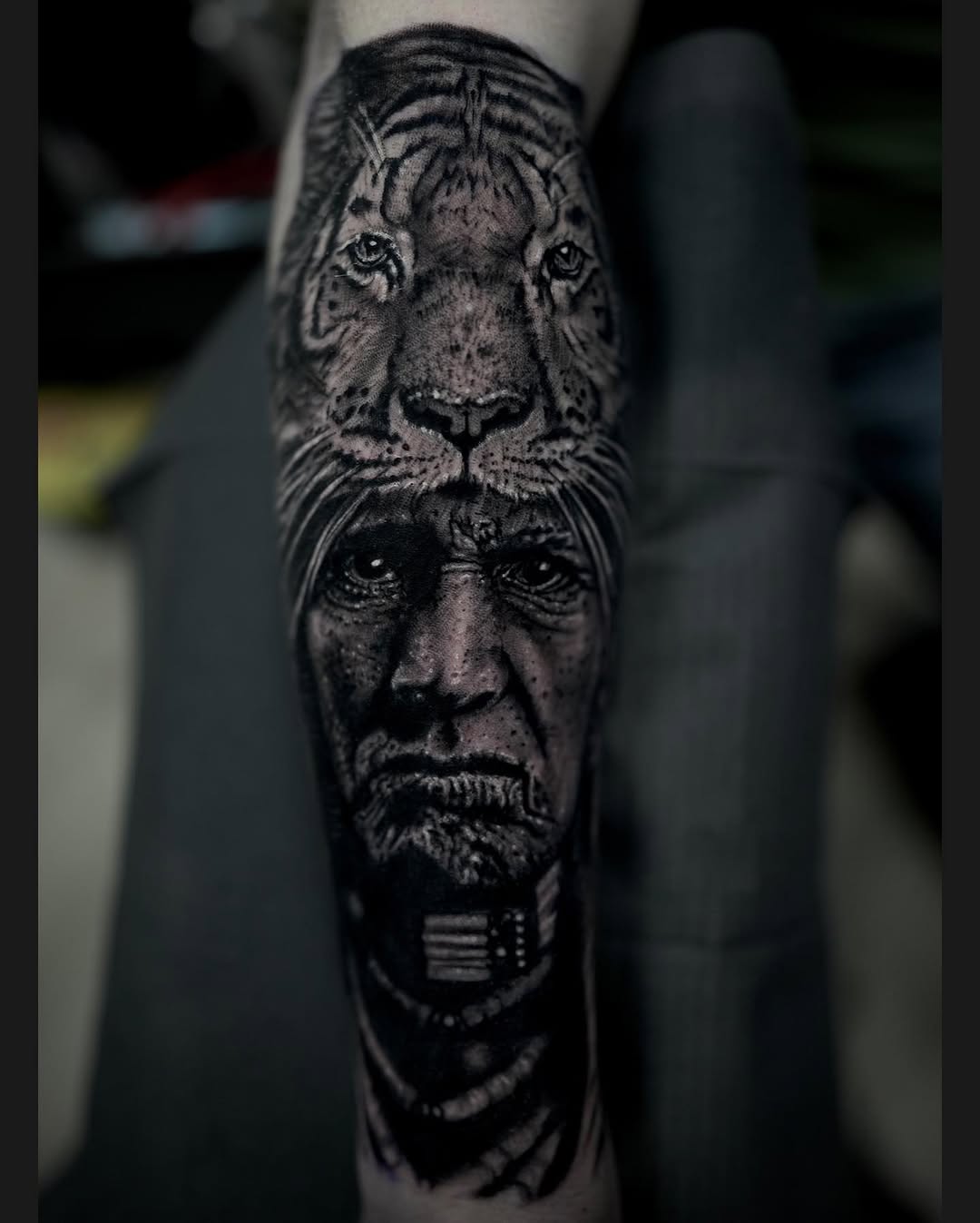 Tiger and native american portrait realism tattoo on the forearm by Ty Pallotta, Austin, Texas
