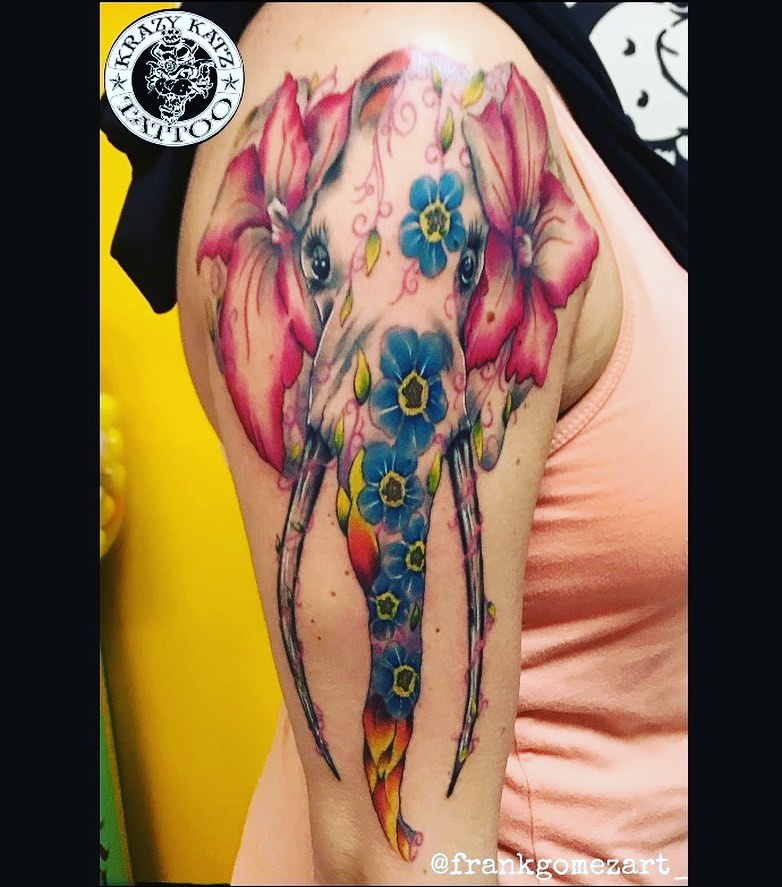 Elephant with flowers watercolor tattoo on the shoulder by Frank Gomez 🎨