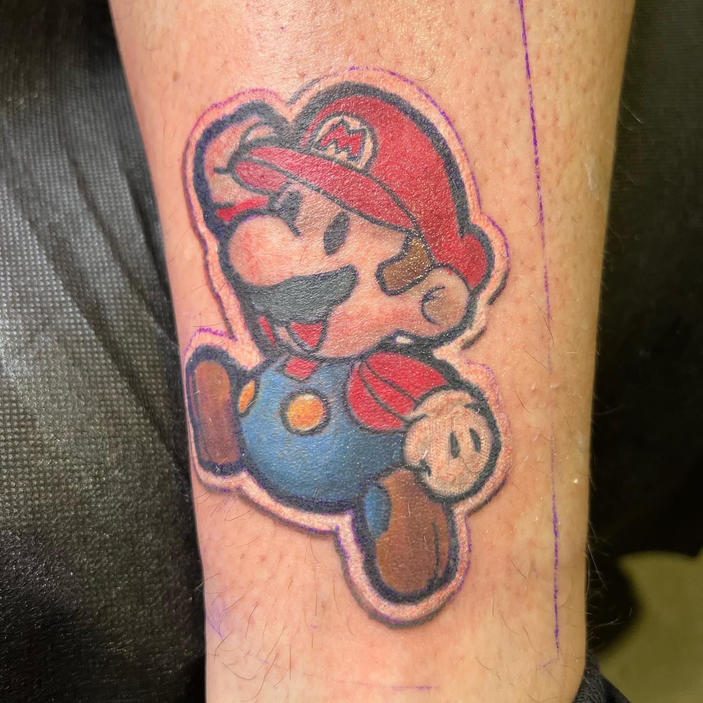 Mario American traditional tattoo on the forearm by Glen Wallis