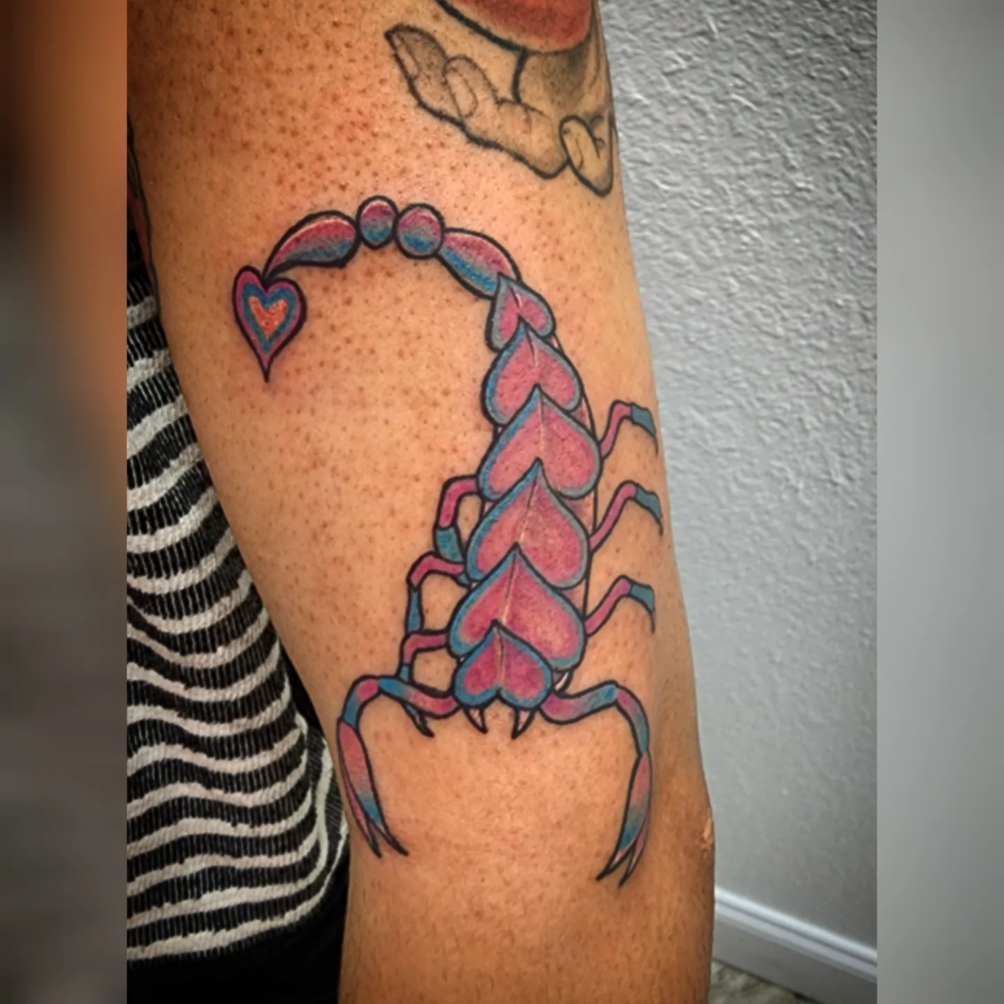 Scorpion geometric tattoo on the forearm by Tyler Cromwell
