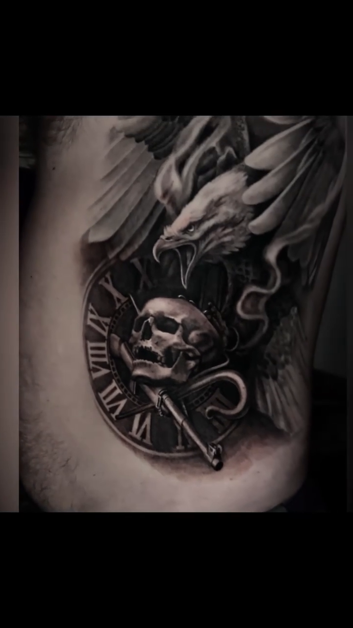 Dragon, skull, and clock realism tattoo by Sean Flood
