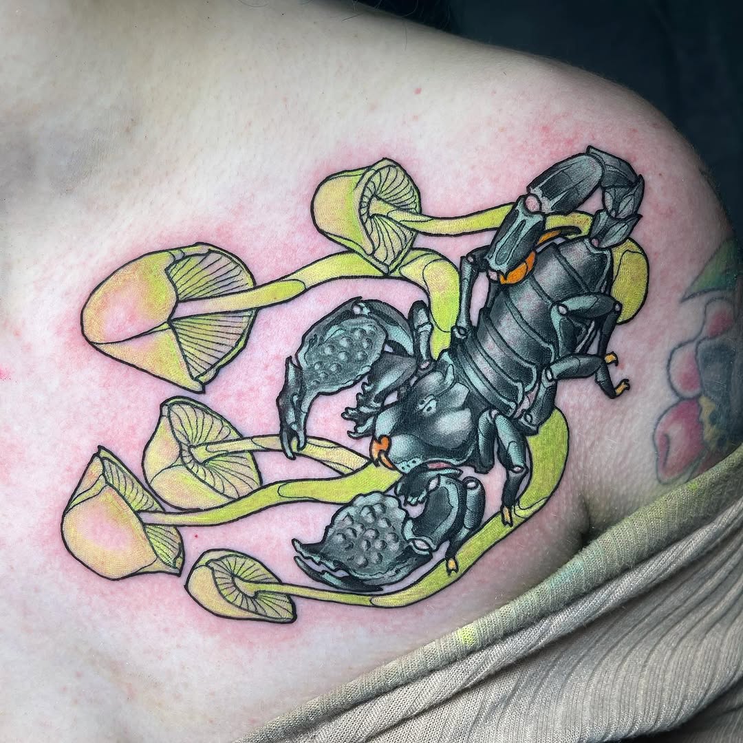 Scorpion and mushrooms American traditional tattoo on the shoulder by Joe Moreira