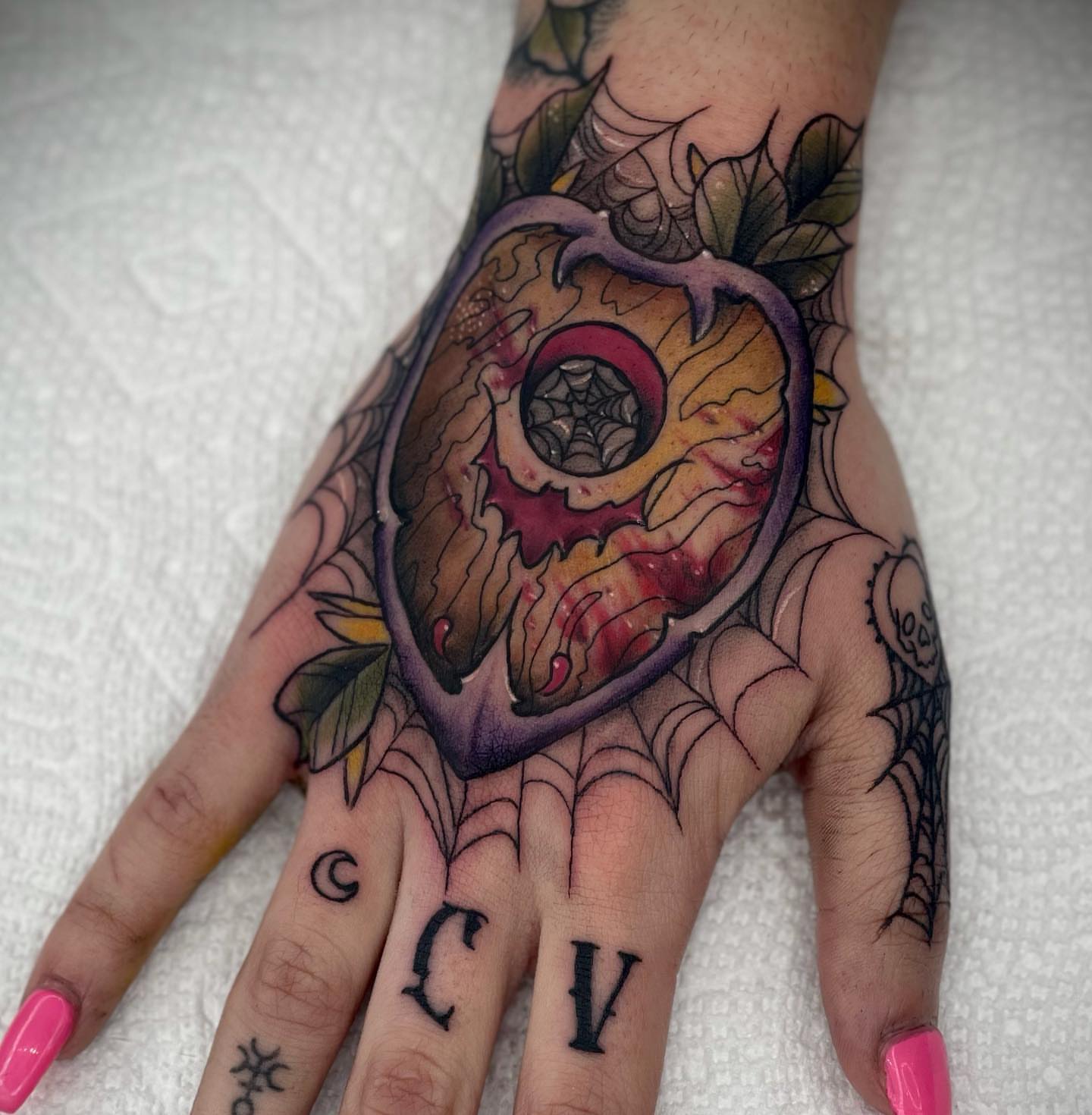 Skeleton heart dark realism tattoo on the hand by E